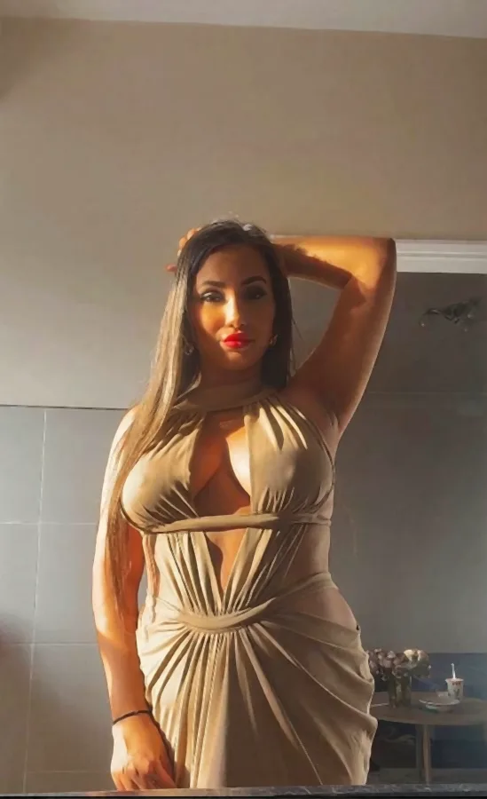 simiera-cream-wrap-dress-standing-arm-raised